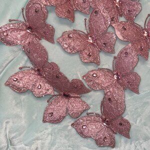 LOT OF 9-PINK SPARKLY BUTTERFLY CLIP ON ORNAMENTS.